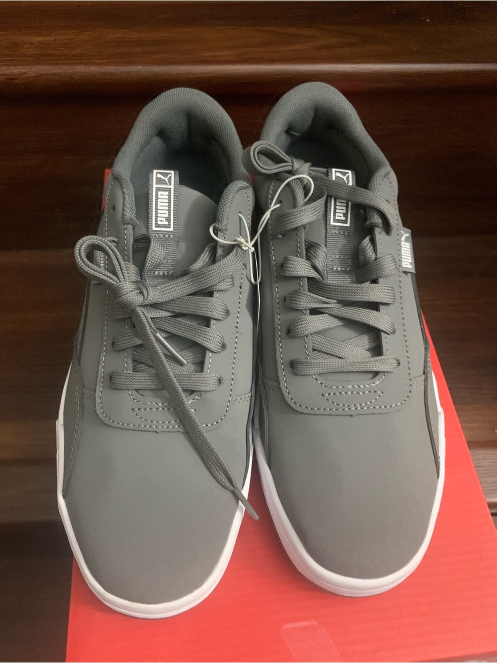 New Men’s Puma Gray Low-Top Sneakers with White Trim. Size 9